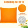Set von 10 leuchtend orange Cornhole Säcken aus strapazierfähigem Canvas, ideal für Outdoor-Spiele und Aktivitäten mit verschiedenen Altersgruppen.
