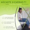 KINETIC SPORTS Premium Outdoor Trampolin Ultimate Pro im Kürbis-Design mit Sicherheitsnetz, geeignet für Kinder und Erwachsene, zeigt eine junge Frau, die entspannt auf einer gepolsterten Unterlage sitzt.